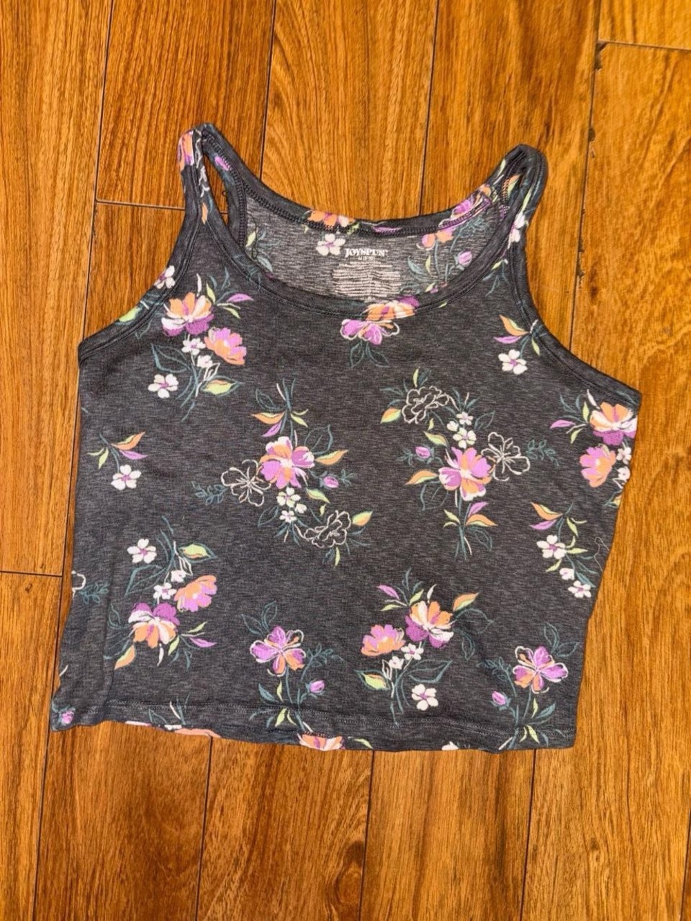 gray tank top with purple and orange floral design